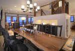 Open concept dining, living, and kitchen areas